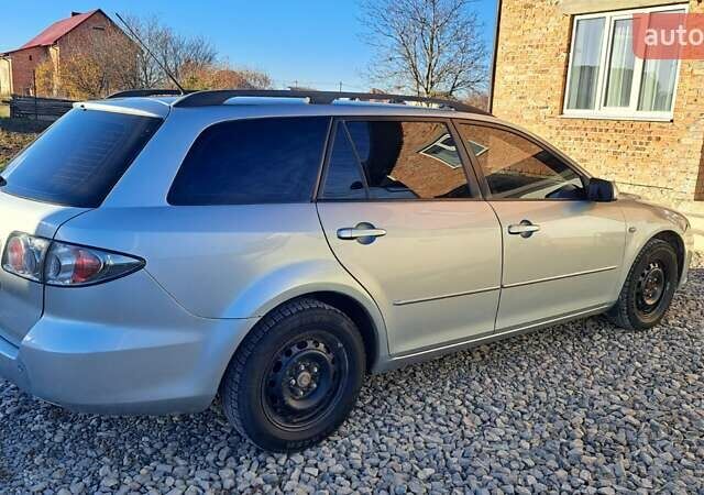 Серый Мазда 6, объемом двигателя 2 л и пробегом 295 тыс. км за 4100 $, фото 1 на Automoto.ua