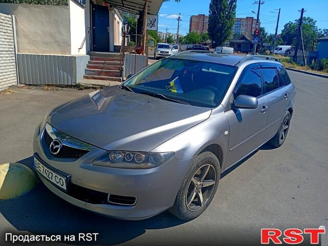 Сірий Мазда 6, об'ємом двигуна 2 л та пробігом 331 тис. км за 3500 $, фото 1 на Automoto.ua
