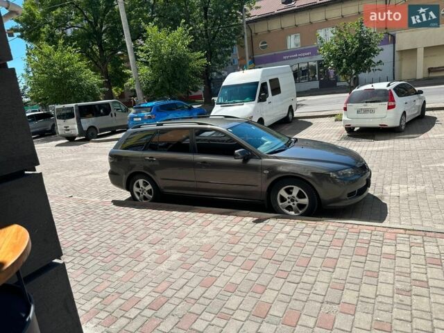 Серый Мазда 6, объемом двигателя 2 л и пробегом 255 тыс. км за 4399 $, фото 1 на Automoto.ua