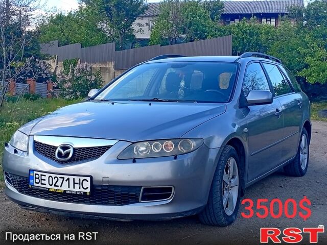 Серый Мазда 6, объемом двигателя 2 л и пробегом 280 тыс. км за 3500 $, фото 1 на Automoto.ua