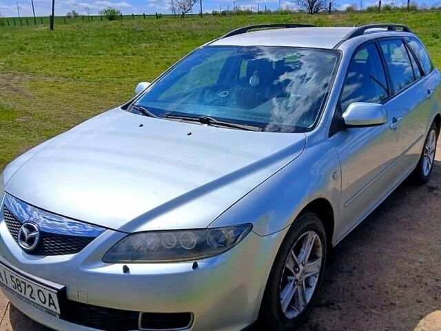 Серый Мазда 6, объемом двигателя 2 л и пробегом 212 тыс. км за 3100 $, фото 1 на Automoto.ua