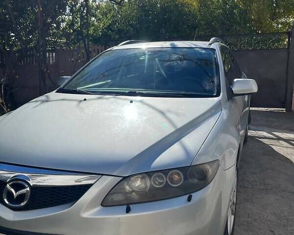 Серый Мазда 6, объемом двигателя 2 л и пробегом 230 тыс. км за 5000 $, фото 1 на Automoto.ua