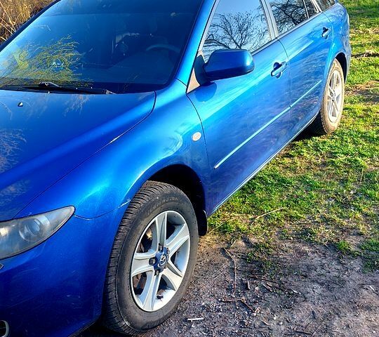 Серый Мазда 6, объемом двигателя 2 л и пробегом 231 тыс. км за 5100 $, фото 1 на Automoto.ua