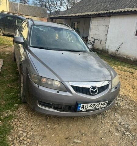Серый Мазда 6, объемом двигателя 1.9 л и пробегом 324 тыс. км за 4200 $, фото 1 на Automoto.ua