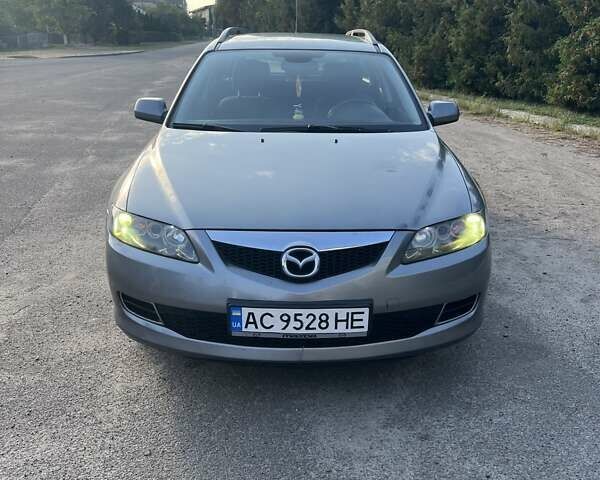 Серый Мазда 6, объемом двигателя 2 л и пробегом 290 тыс. км за 4200 $, фото 1 на Automoto.ua