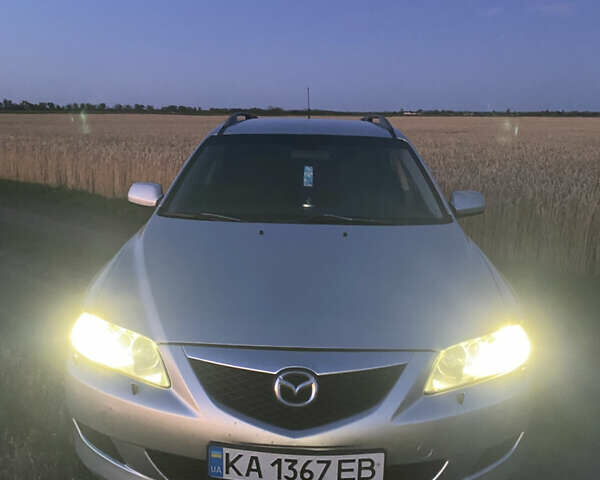 Серый Мазда 6, объемом двигателя 2 л и пробегом 250 тыс. км за 4200 $, фото 1 на Automoto.ua