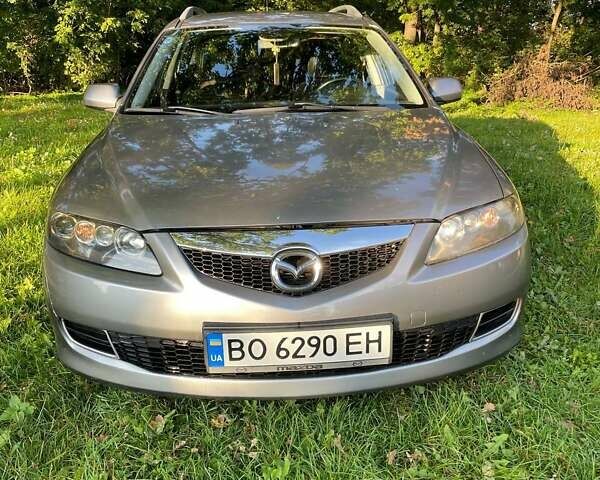 Серый Мазда 6, объемом двигателя 2 л и пробегом 393 тыс. км за 4000 $, фото 1 на Automoto.ua