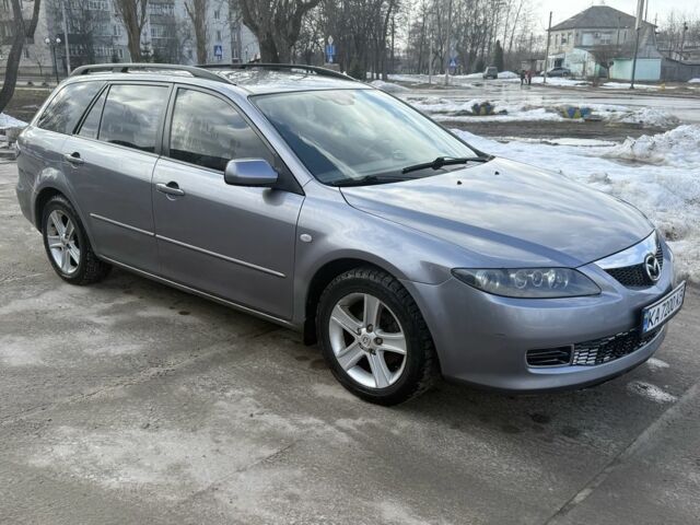 Серый Мазда 6, объемом двигателя 2 л и пробегом 200 тыс. км за 5200 $, фото 1 на Automoto.ua
