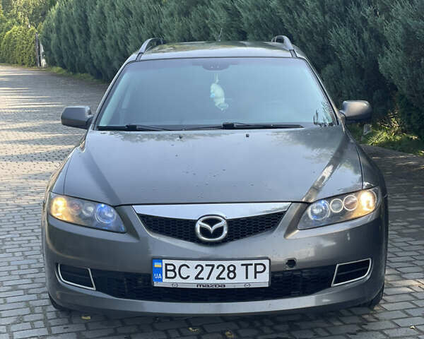 Серый Мазда 6, объемом двигателя 2 л и пробегом 377 тыс. км за 4000 $, фото 1 на Automoto.ua