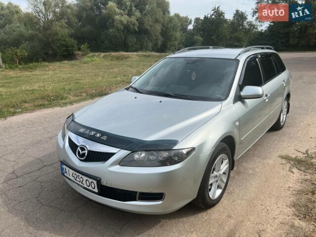 Серый Мазда 6, объемом двигателя 2 л и пробегом 276 тыс. км за 5700 $, фото 1 на Automoto.ua