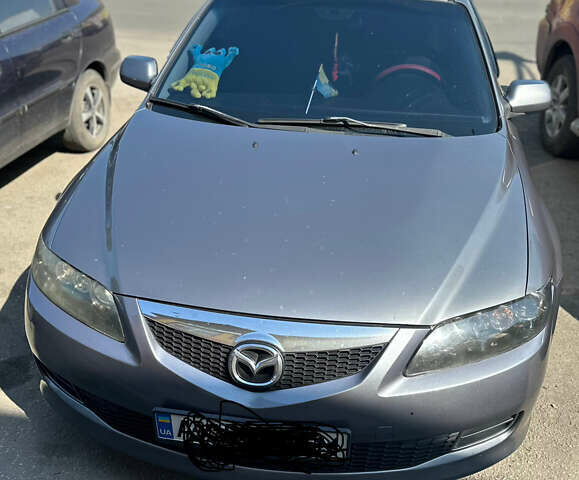 Серый Мазда 6, объемом двигателя 2 л и пробегом 291 тыс. км за 5000 $, фото 1 на Automoto.ua