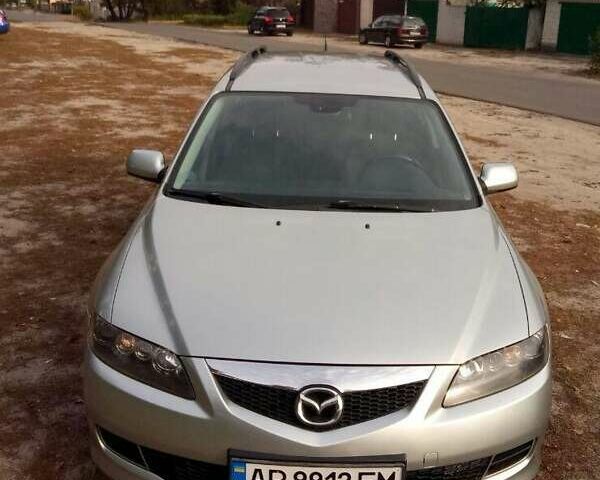 Серый Мазда 6, объемом двигателя 2 л и пробегом 247 тыс. км за 5350 $, фото 1 на Automoto.ua