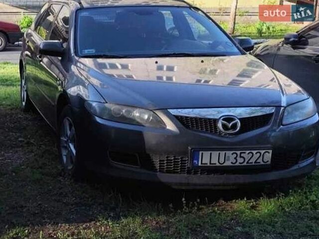 Серый Мазда 6, объемом двигателя 2 л и пробегом 265 тыс. км за 3200 $, фото 1 на Automoto.ua