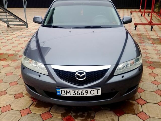 Серый Мазда 6, объемом двигателя 2 л и пробегом 450 тыс. км за 5999 $, фото 1 на Automoto.ua