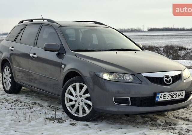 Серый Мазда 6, объемом двигателя 2 л и пробегом 230 тыс. км за 6000 $, фото 1 на Automoto.ua