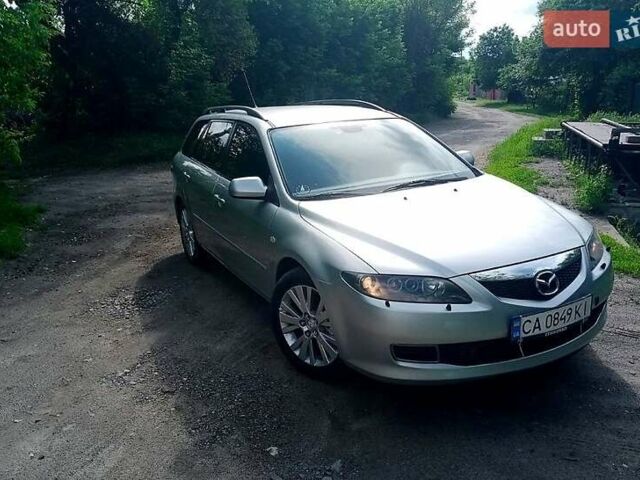 Серый Мазда 6, объемом двигателя 2 л и пробегом 220 тыс. км за 5700 $, фото 1 на Automoto.ua