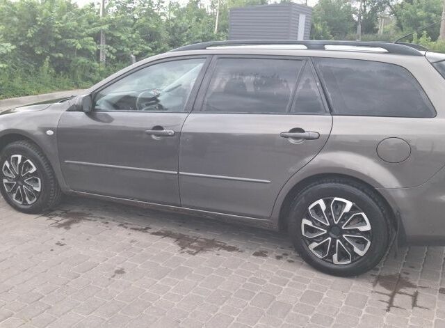 Сірий Мазда 6, об'ємом двигуна 2 л та пробігом 344 тис. км за 2802 $, фото 1 на Automoto.ua