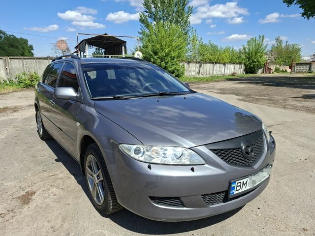 Серый Мазда 6, объемом двигателя 2 л и пробегом 265 тыс. км за 4588 $, фото 1 на Automoto.ua