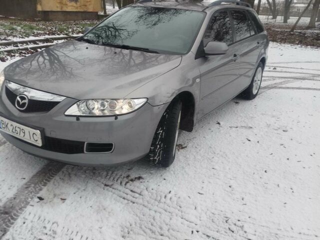 Серый Мазда 6, объемом двигателя 2 л и пробегом 306 тыс. км за 4300 $, фото 1 на Automoto.ua