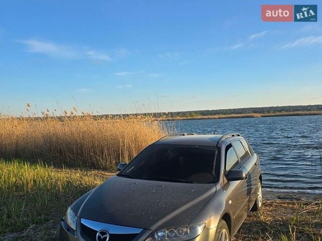 Серый Мазда 6, объемом двигателя 2 л и пробегом 205 тыс. км за 5300 $, фото 1 на Automoto.ua