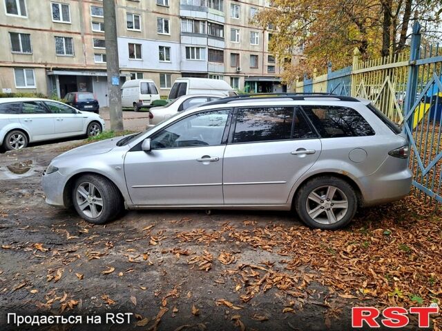 Серый Мазда 6, объемом двигателя 2 л и пробегом 235 тыс. км за 4000 $, фото 1 на Automoto.ua