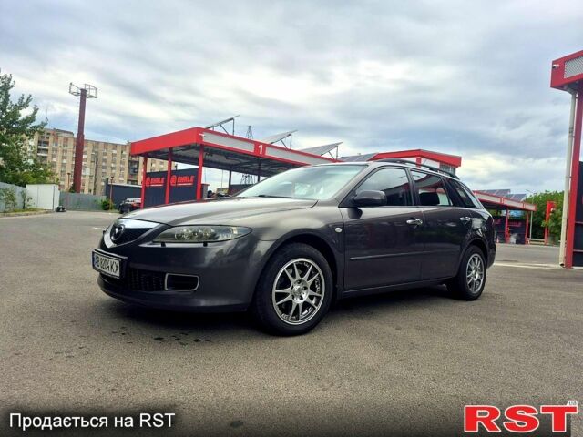 Серый Мазда 6, объемом двигателя 1.8 л и пробегом 230 тыс. км за 6000 $, фото 1 на Automoto.ua