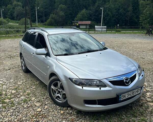 Серый Мазда 6, объемом двигателя 1.8 л и пробегом 130 тыс. км за 5500 $, фото 1 на Automoto.ua