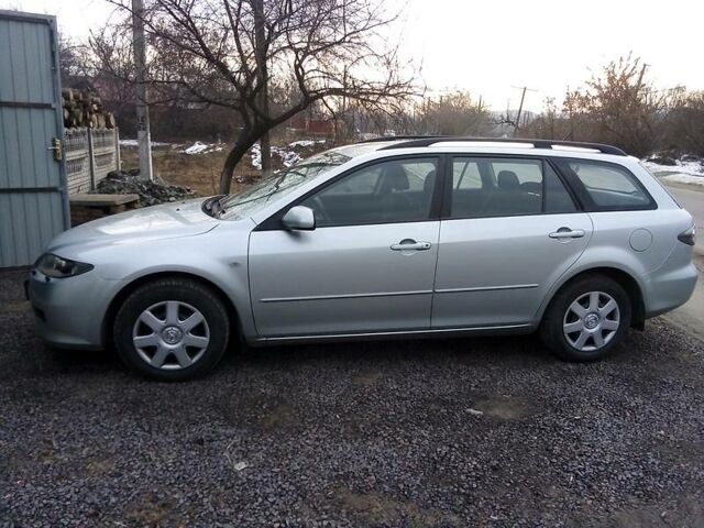 Сірий Мазда 6, об'ємом двигуна 2 л та пробігом 214 тис. км за 6700 $, фото 1 на Automoto.ua