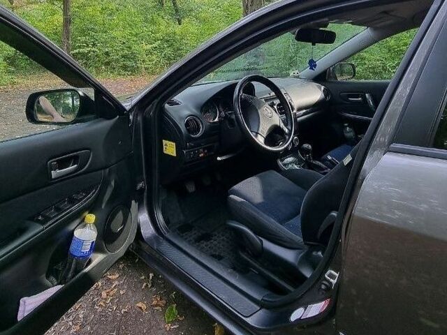 Серый Мазда 6, объемом двигателя 2 л и пробегом 205 тыс. км за 5000 $, фото 1 на Automoto.ua