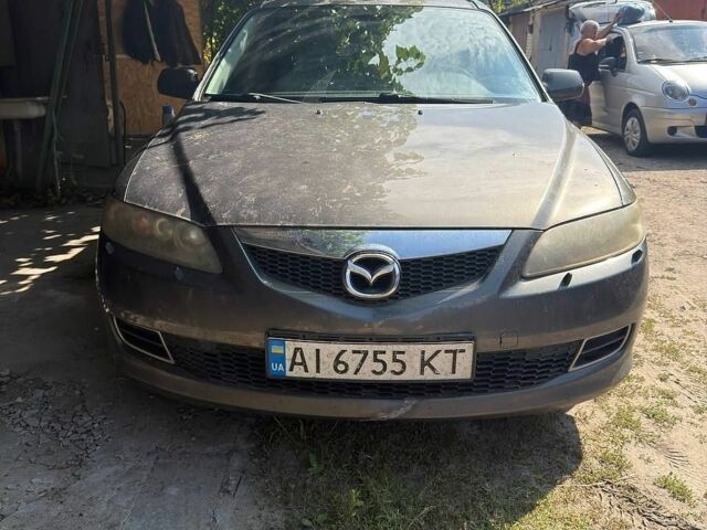 Сірий Мазда 6, об'ємом двигуна 2 л та пробігом 242 тис. км за 4900 $, фото 1 на Automoto.ua