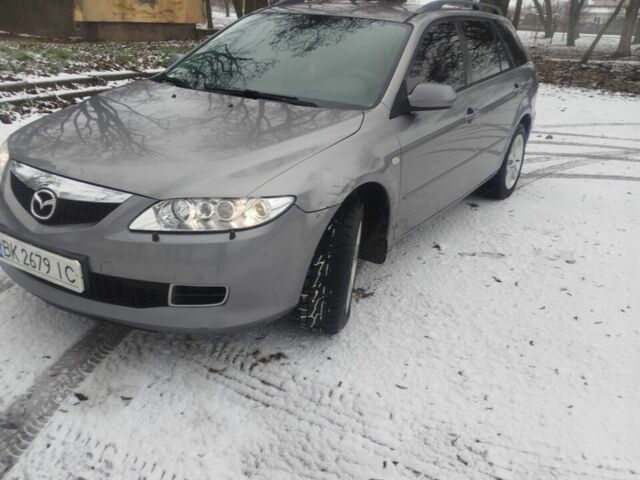 Сірий Мазда 6, об'ємом двигуна 2 л та пробігом 306 тис. км за 4300 $, фото 1 на Automoto.ua