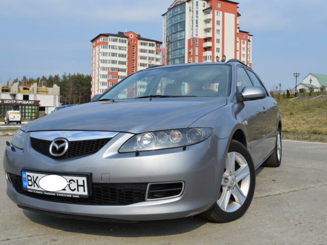 Серый Мазда 6, объемом двигателя 2 л и пробегом 210 тыс. км за 7200 $, фото 1 на Automoto.ua