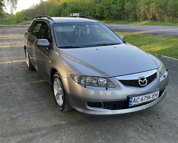 Серый Мазда 6, объемом двигателя 2 л и пробегом 293 тыс. км за 5200 $, фото 1 на Automoto.ua