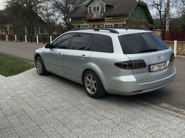 Серый Мазда 6, объемом двигателя 2 л и пробегом 232 тыс. км за 5300 $, фото 1 на Automoto.ua