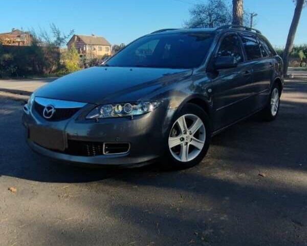 Серый Мазда 6, объемом двигателя 2 л и пробегом 200 тыс. км за 4900 $, фото 1 на Automoto.ua