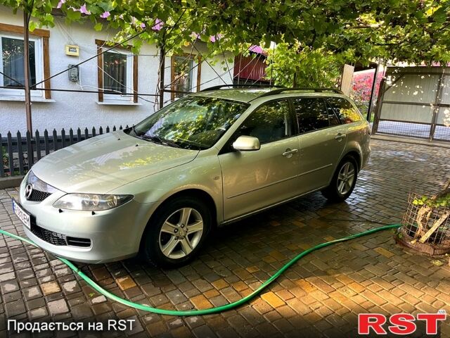 Серый Мазда 6, объемом двигателя 2 л и пробегом 215 тыс. км за 4100 $, фото 1 на Automoto.ua