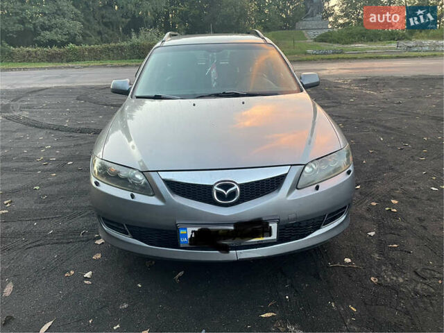 Серый Мазда 6, объемом двигателя 2 л и пробегом 252 тыс. км за 3500 $, фото 1 на Automoto.ua