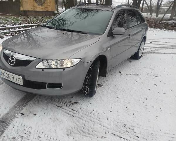 Серый Мазда 6, объемом двигателя 2 л и пробегом 306 тыс. км за 4300 $, фото 1 на Automoto.ua