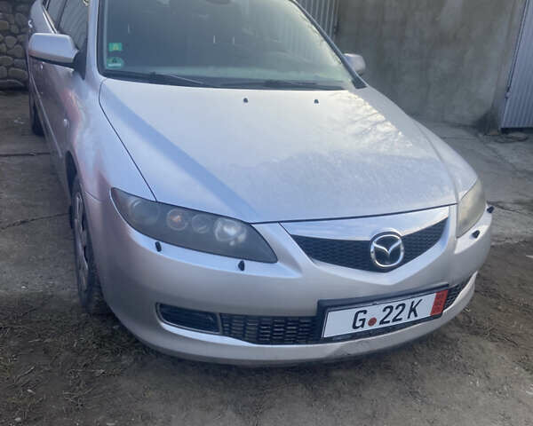 Серый Мазда 6, объемом двигателя 2 л и пробегом 236 тыс. км за 4850 $, фото 1 на Automoto.ua