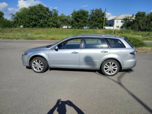 Серый Мазда 6, объемом двигателя 2 л и пробегом 220 тыс. км за 5590 $, фото 1 на Automoto.ua