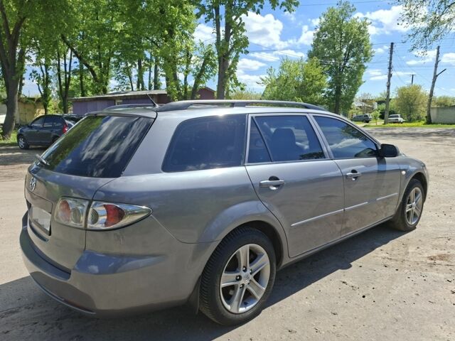 Серый Мазда 6, объемом двигателя 2 л и пробегом 250 тыс. км за 4636 $, фото 1 на Automoto.ua