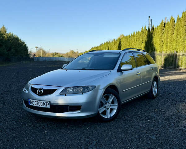 Серый Мазда 6, объемом двигателя 2 л и пробегом 237 тыс. км за 3950 $, фото 1 на Automoto.ua