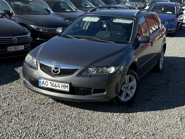 Сірий Мазда 6, об'ємом двигуна 2 л та пробігом 261 тис. км за 4453 $, фото 1 на Automoto.ua