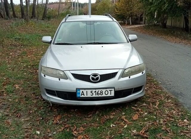 Серый Мазда 6, объемом двигателя 2 л и пробегом 247 тыс. км за 4000 $, фото 1 на Automoto.ua