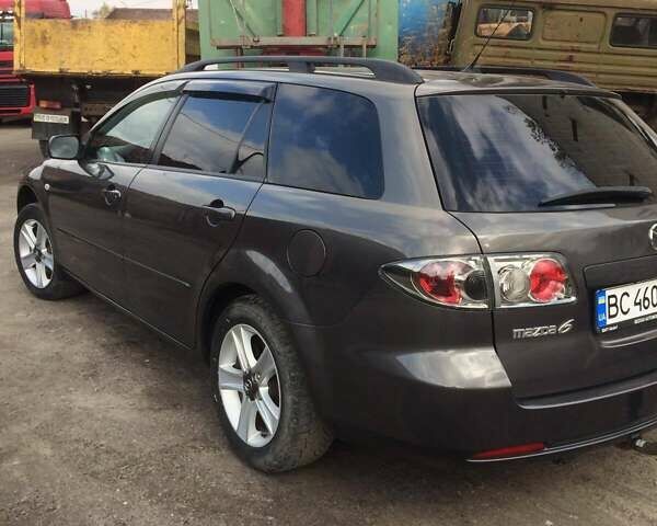 Серый Мазда 6, объемом двигателя 2 л и пробегом 230 тыс. км за 6500 $, фото 1 на Automoto.ua