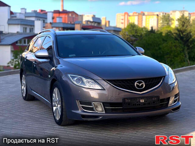 Серый Мазда 6, объемом двигателя 2 л и пробегом 212 тыс. км за 6600 $, фото 1 на Automoto.ua