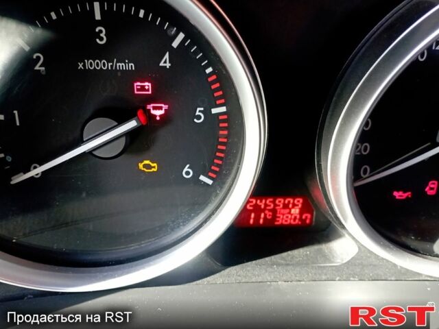 Серый Мазда 6, объемом двигателя 2 л и пробегом 246 тыс. км за 7600 $, фото 1 на Automoto.ua