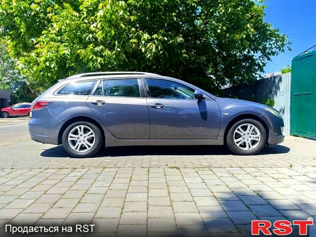Серый Мазда 6, объемом двигателя 2 л и пробегом 212 тыс. км за 7700 $, фото 1 на Automoto.ua
