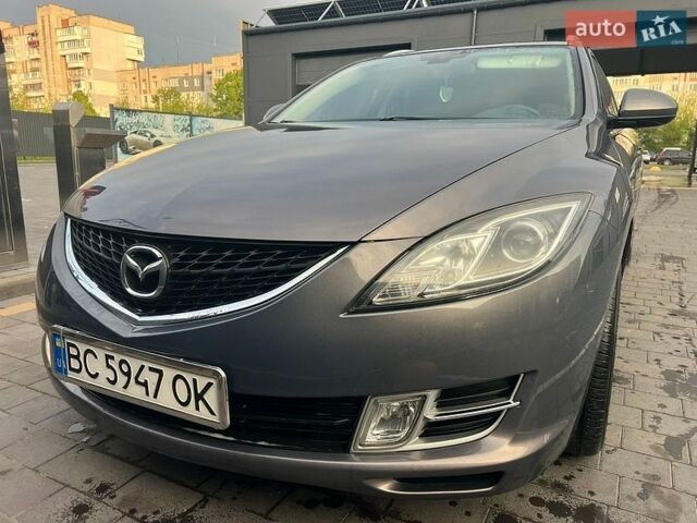 Серый Мазда 6, объемом двигателя 2 л и пробегом 254 тыс. км за 7100 $, фото 1 на Automoto.ua