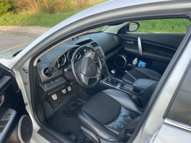 Серый Мазда 6, объемом двигателя 2 л и пробегом 270 тыс. км за 6400 $, фото 1 на Automoto.ua